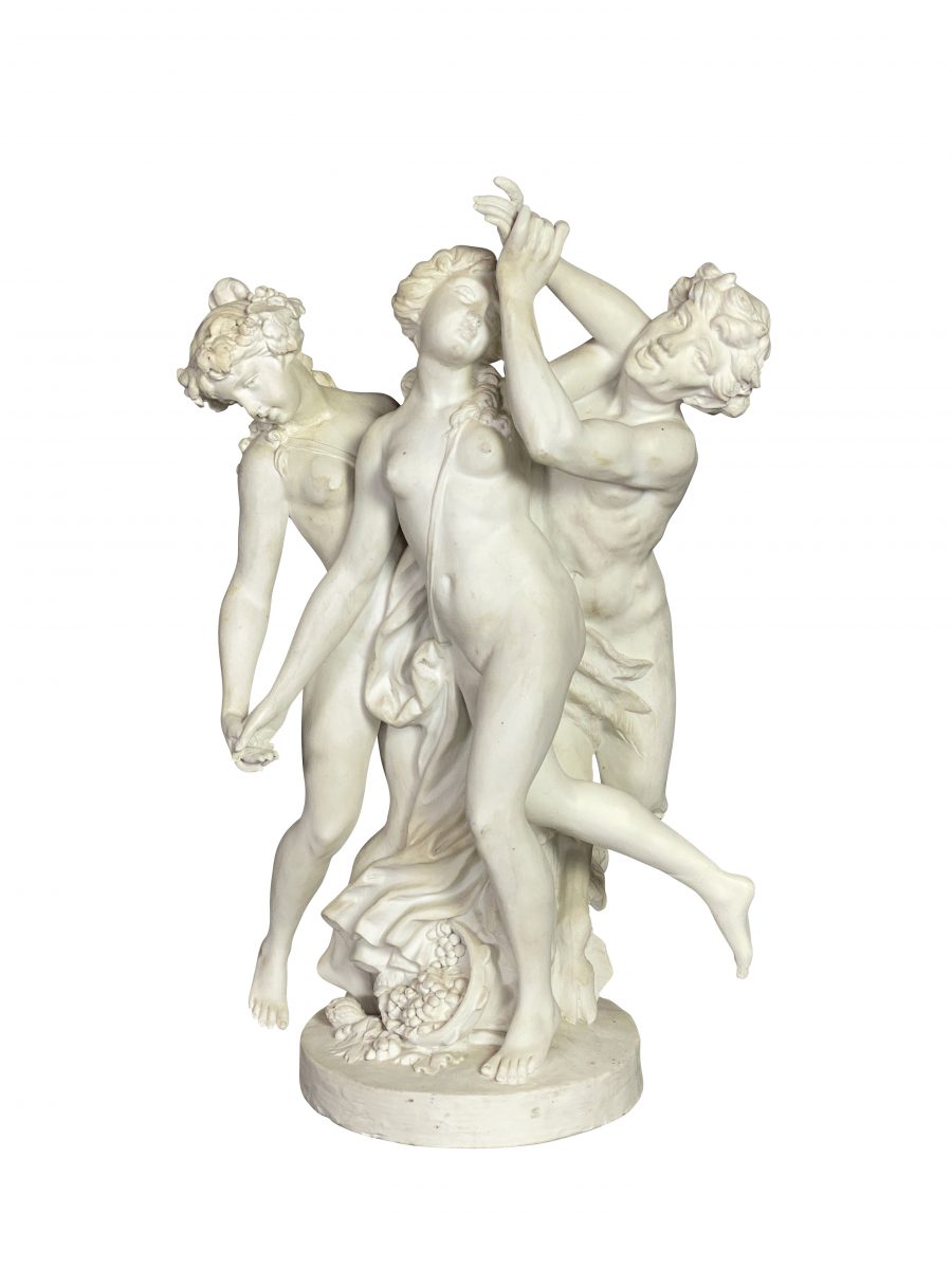 French Bisque Porcelain Centerpiece. Featuring two nude woman with a figure of Pan.