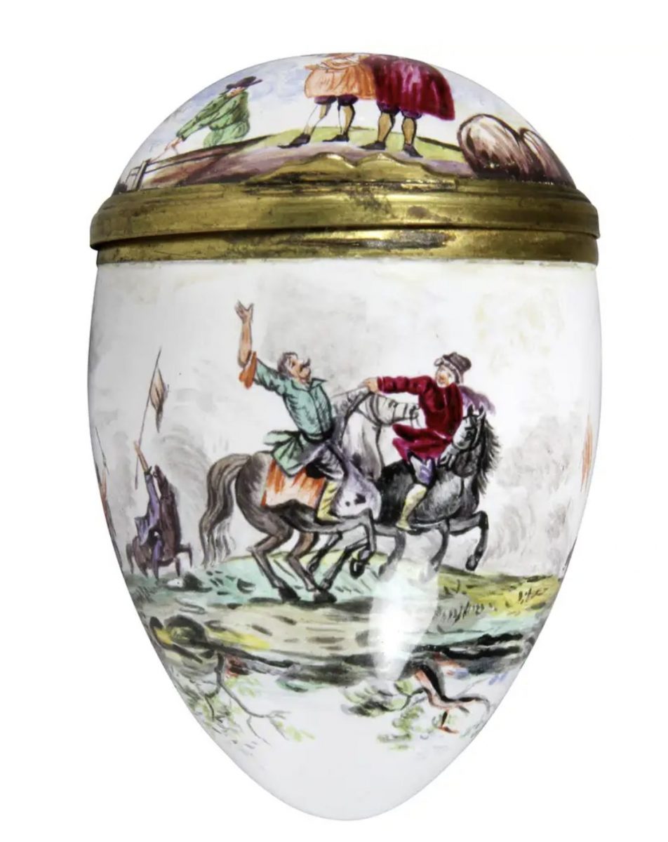 Egg Shaped Enamel Box is depicting land battles and a seascape. Gilt metal fittings.