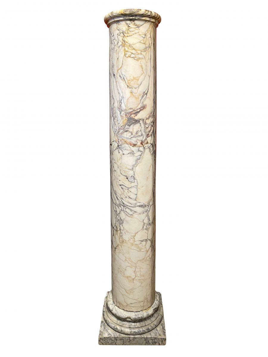 French Marble Column. The tall column sitting on a socle with square base.